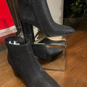 Kate spade black booties; with a hint of shimmer. pointed toe, 3” heel.